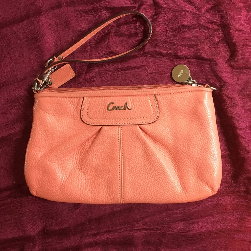 Coach coral leather wristlet